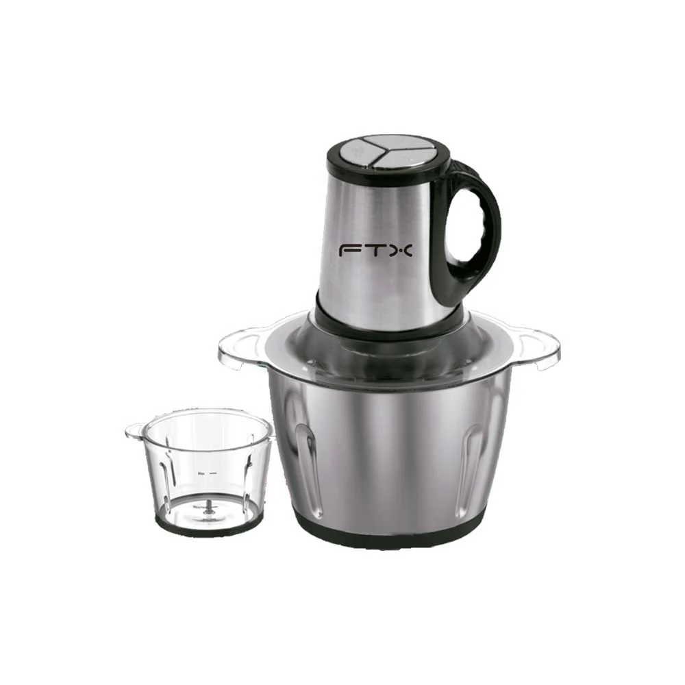Picadora FTX de cuerpo metálico con asa negra, recipiente principal con tapa transparente y taza transparente separada.
