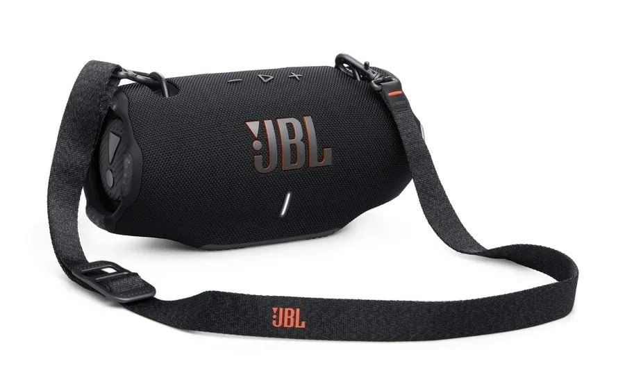 Parlante portátil JBL Xtreme 4 negro con cuerpo de tela, controles superiores y correa de transporte.