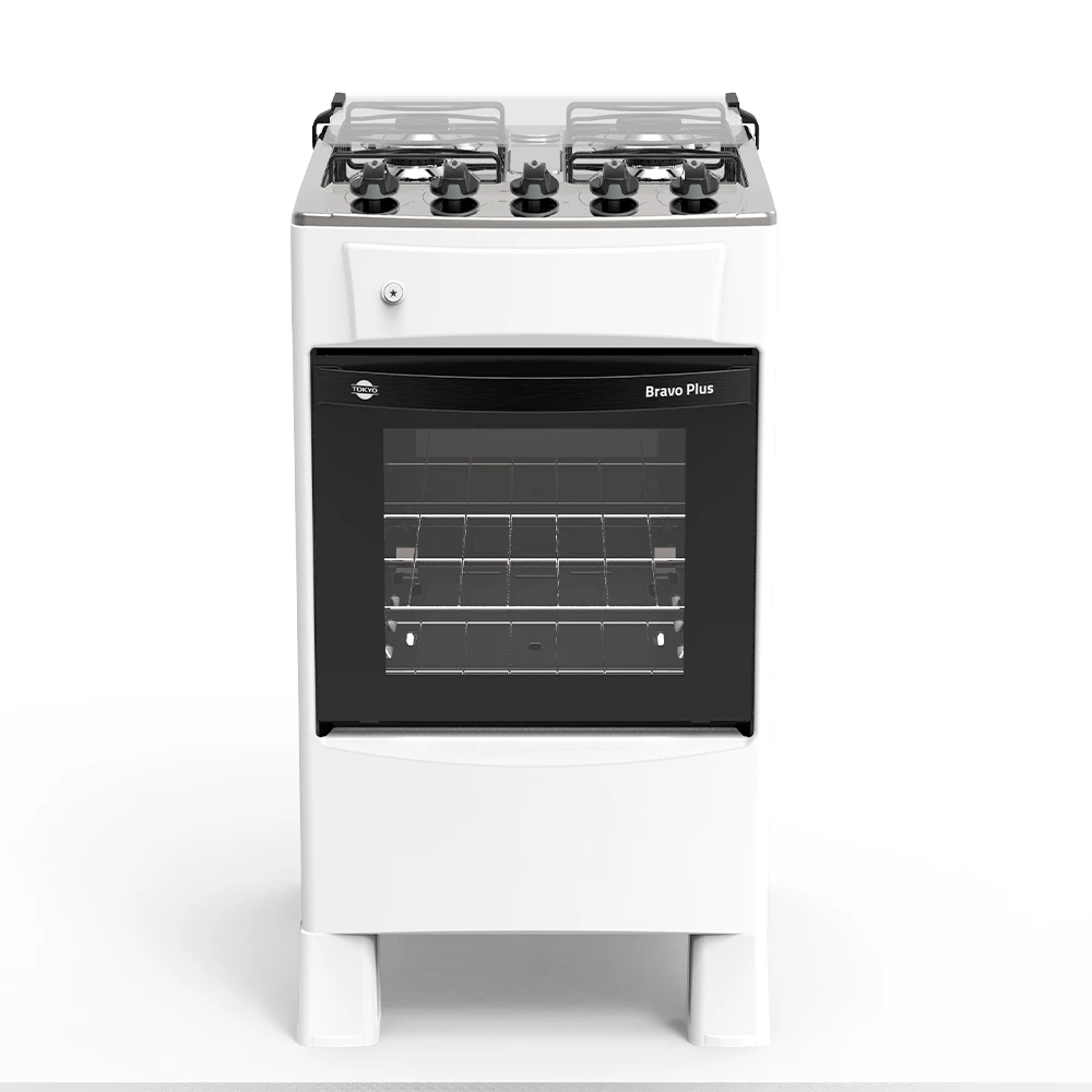 Cocina Tokyo Bravo Plus blanca con mesa plateada, cuatro hornallas, perillas superiores y horno con puerta de vidrio oscuro. - Vista 2