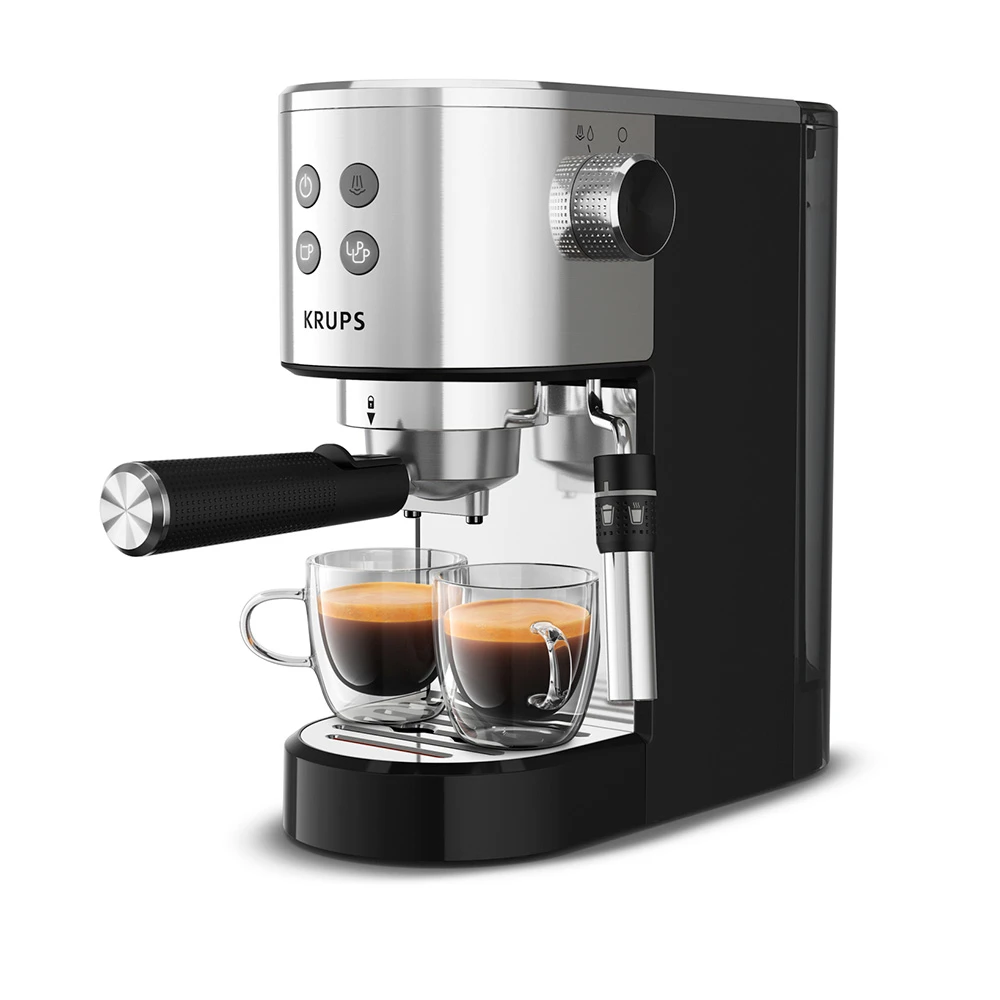 Cafetera espresso Krups negra y plateada con portafiltro, mando giratorio frontal y lanza lateral.