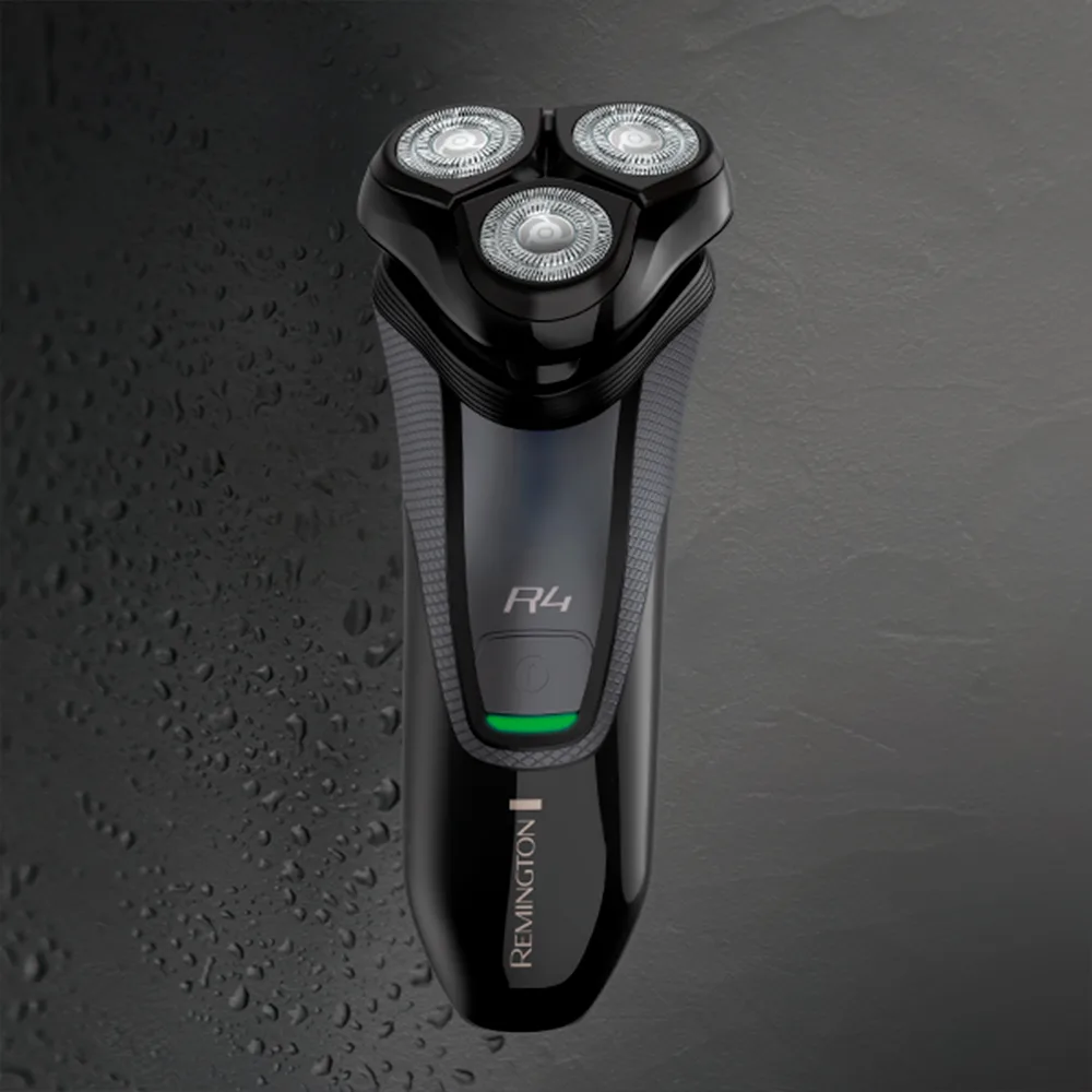 Afeitadora Remington R4 negra con tres cabezales rotativos, botón de encendido e indicador verde - Vista 2