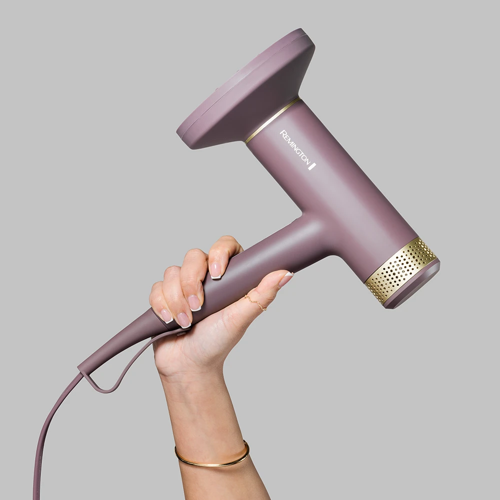 Secador Remington AIRvive rosa malva con banda perforada dorada, cable, boquilla concentradora y difusor circular. - Vista 3