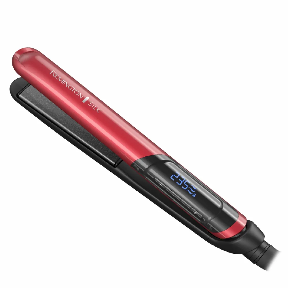 Alisador Remington Silk rojo y negro, con placas oscuras, pantalla digital azul y cable conectado.