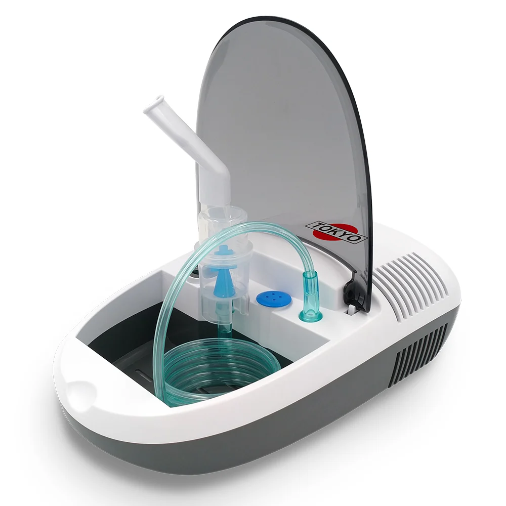 Nebulizador de sobremesa blanco y gris con tubo transparente conectado al conjunto nebulizador.