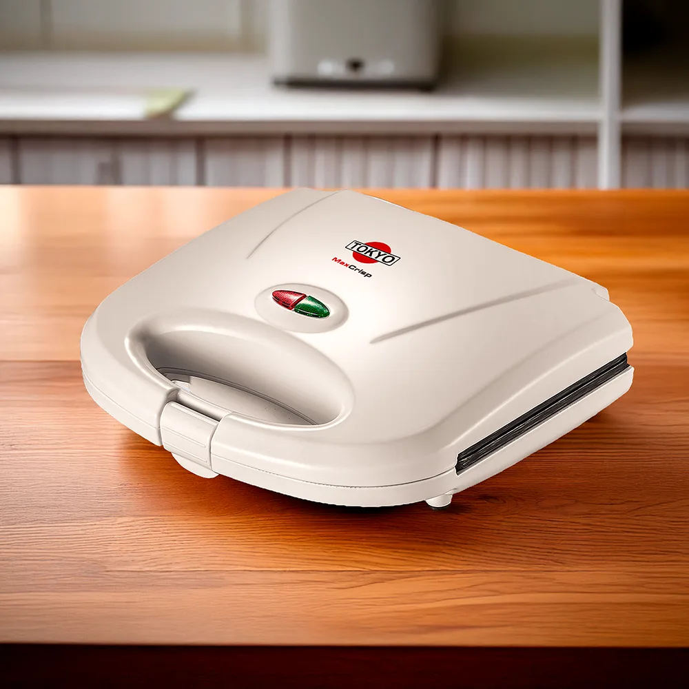 Sandwichera Tokyo Maxcrisp blanca con asa frontal, tapa cerrada y dos indicadores luminosos. - Vista 2
