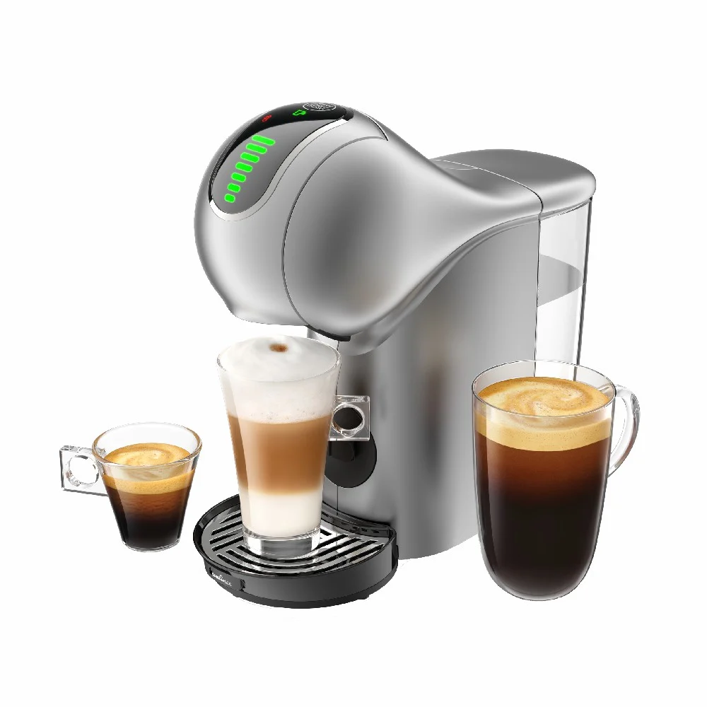 Cafetera de cápsulas Moulinex Genio S Touch plateada, con depósito transparente, panel táctil negro y bandeja de goteo con rejilla metálica.