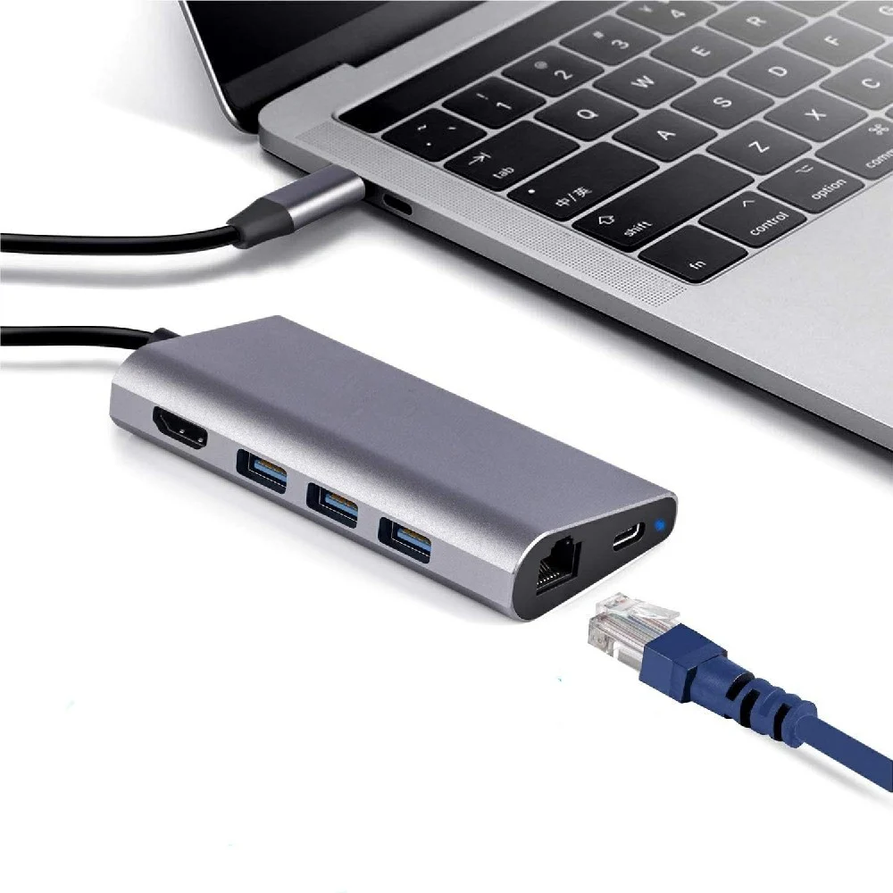 Adaptador multipuerto gris con cable USB-C, puertos HDMI y RJ45, tres USB-A, ranuras SD y TF y puerto USB-C PD. - Vista 2