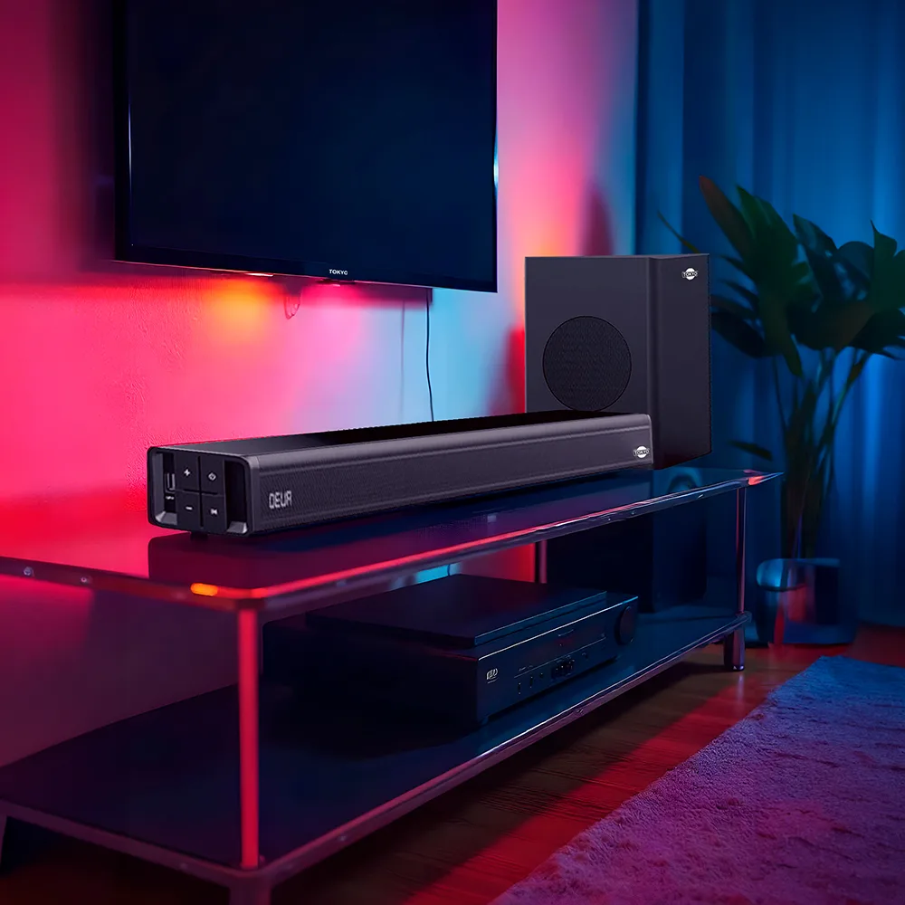 Sistema de sonido negro Tokyo con barra de sonido alargada, subwoofer vertical y control remoto. - Vista 3