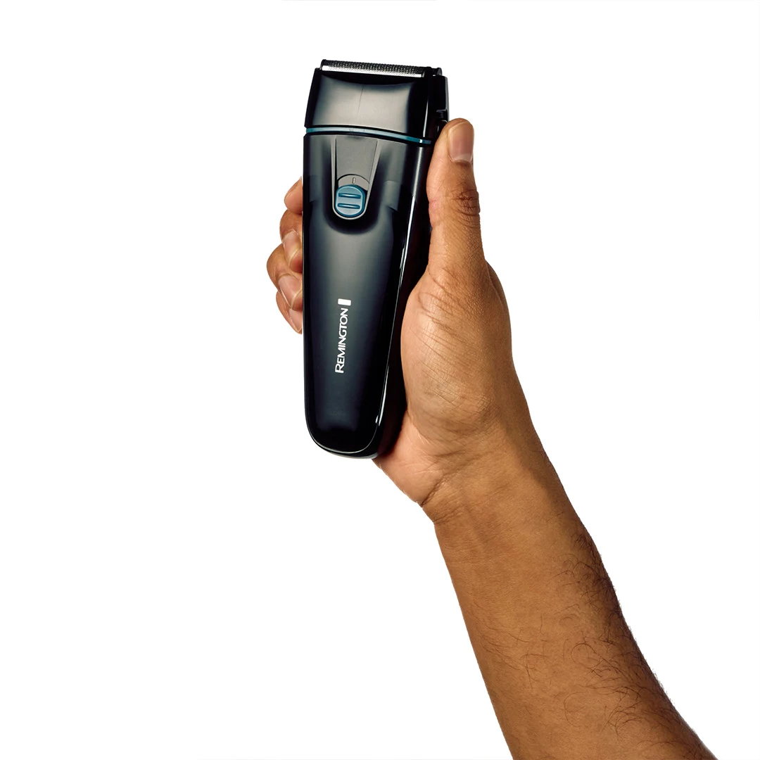Afeitadora Remington F1001A negra con detalles azules, cabezal de láminas, tapa protectora, cepillo y cable USB - Vista 2