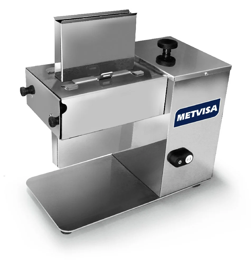 Ablandador de carne Metvisa de acero inoxidable con boca de alimentación protegida, interruptor y patas de goma.