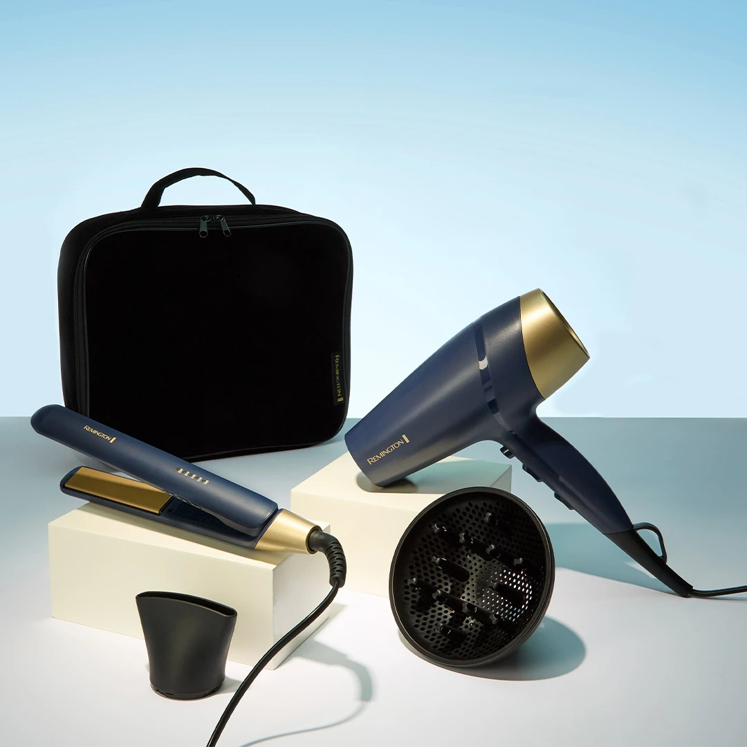 Combo Remington Sapphire Luxe violeta y dorado con planchita, secador, accesorios y estuche negro. - Vista 3